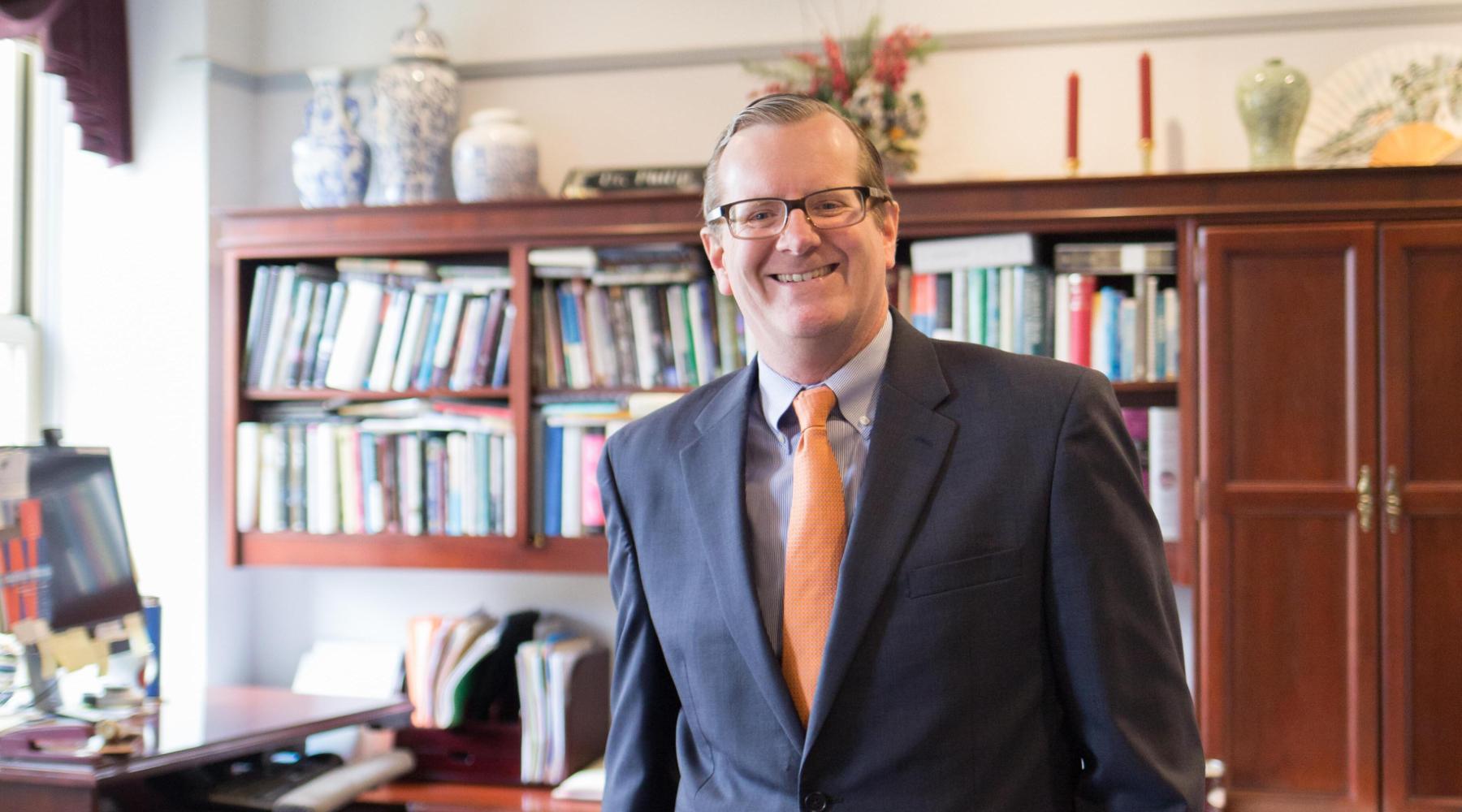 Philip Ryken in his office in front of bookcase