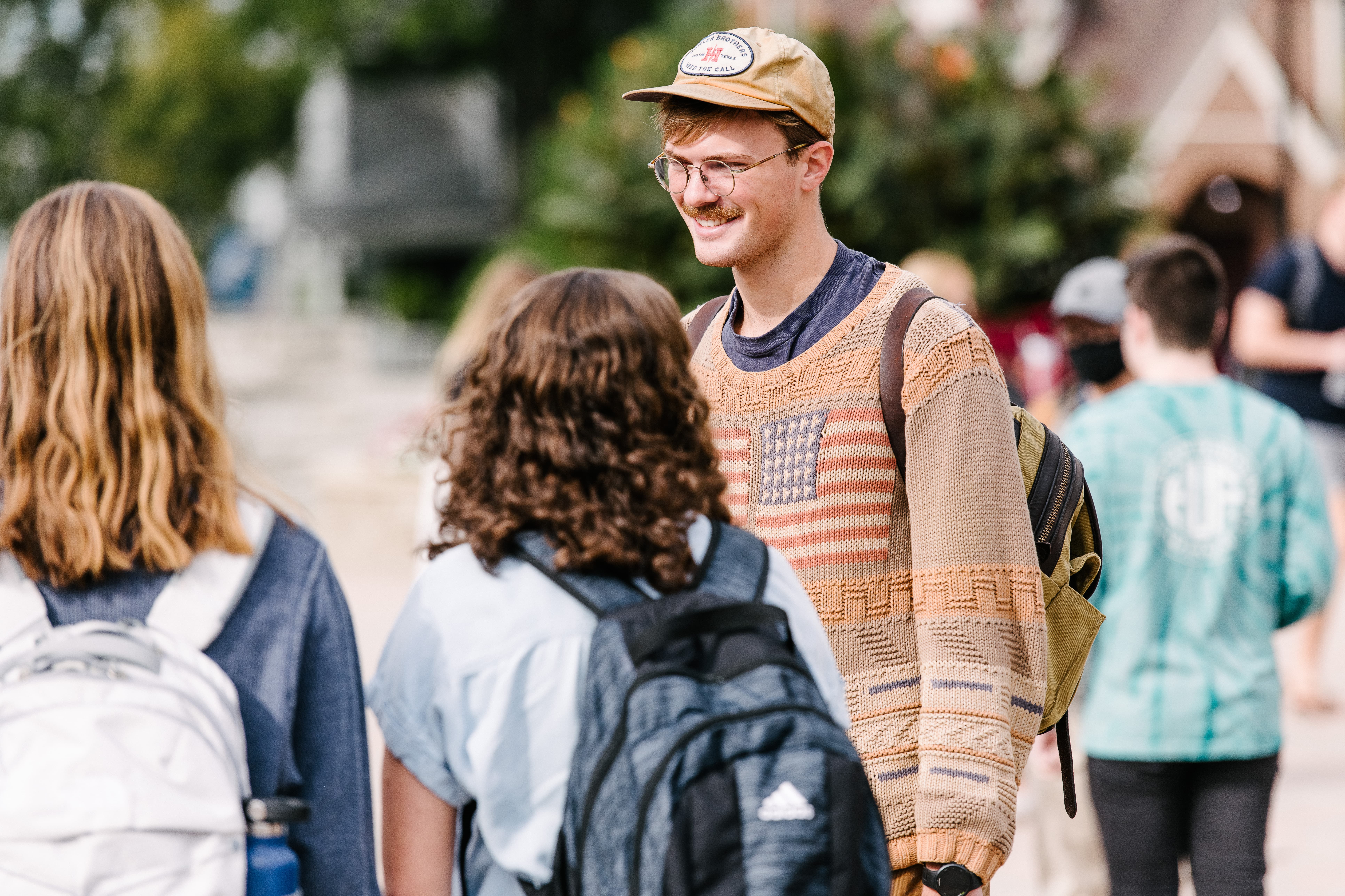 Student chatting in Wheaton College Campus