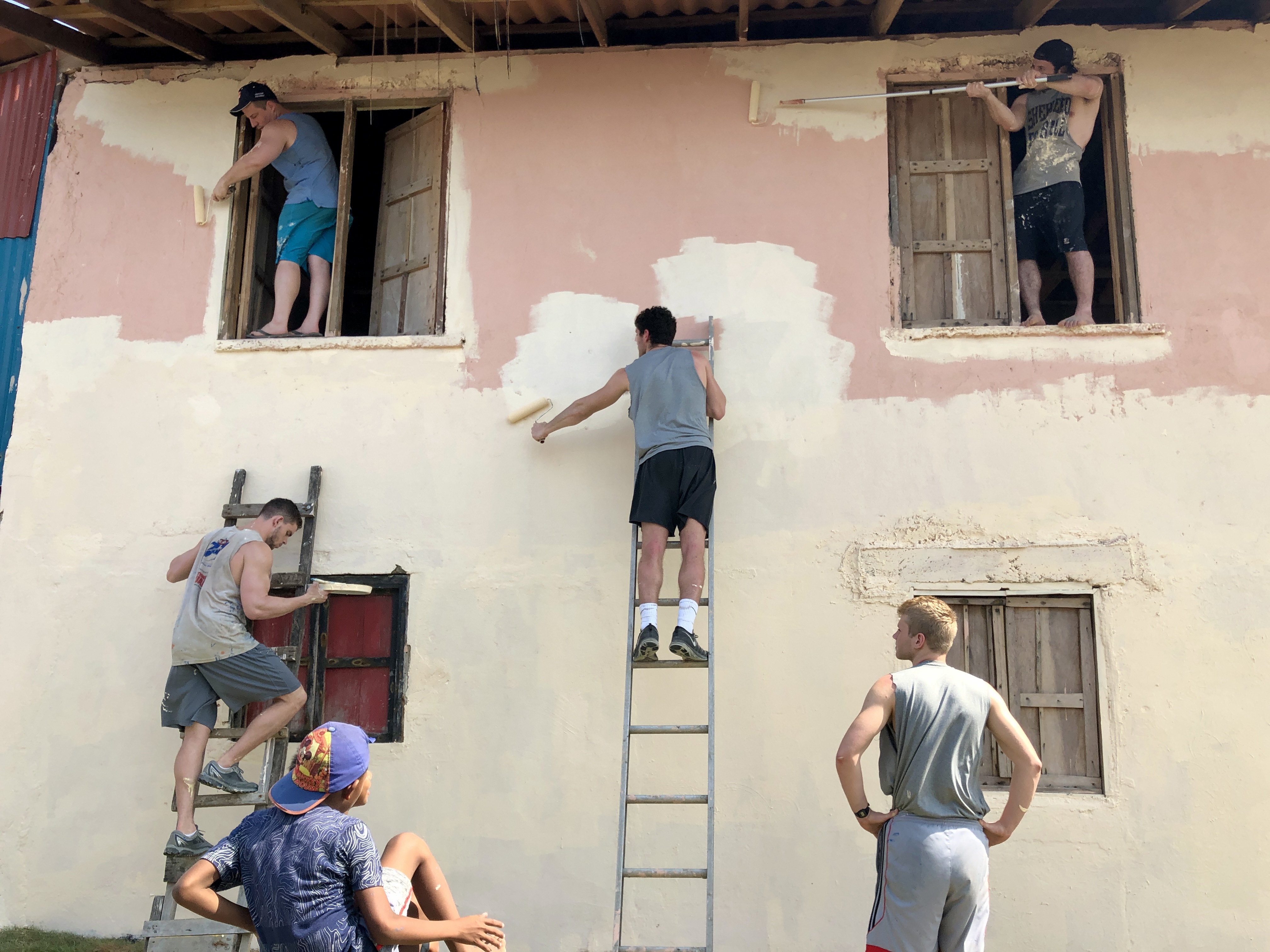 Wheaton football players painting a parsonage on the San Blas Islands, Panama in 2019.